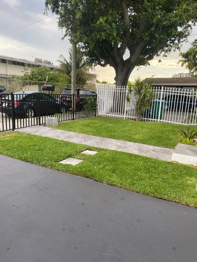 Expert lawn care service with custom design in Miami, FL by Henrys Landscaping