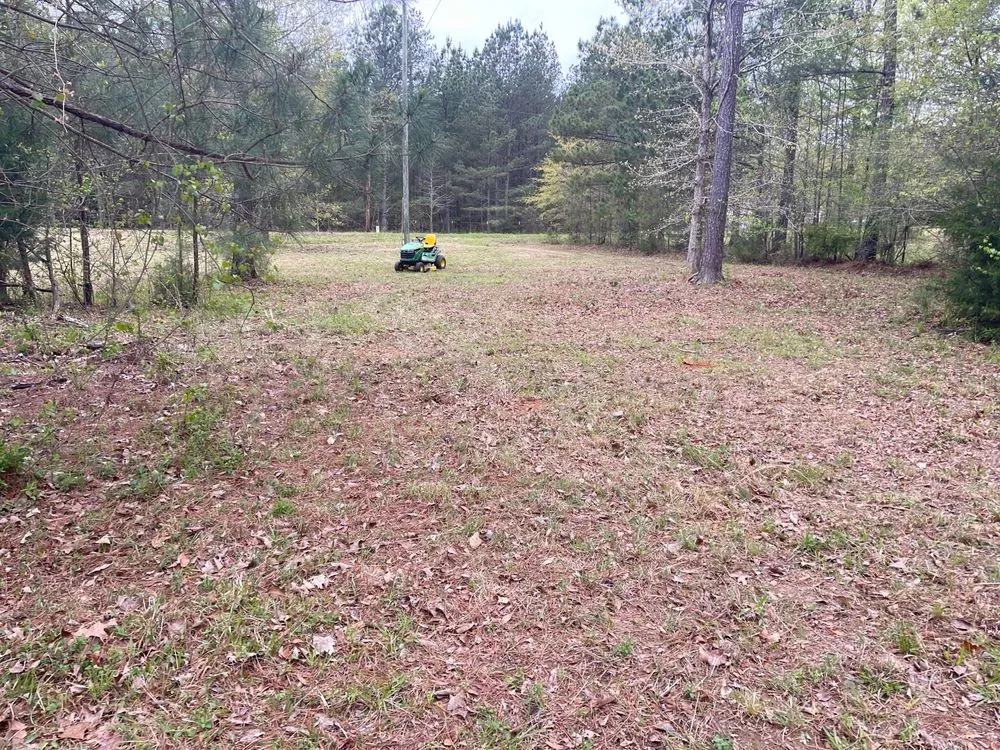 Custom landscape installation in Greenwood, SC by Herbal Gardens Homestead Garden Design & Lawn Care