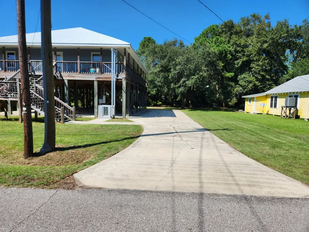 Top-rated outdoor landscaping in Dauphin Island, AL by Here We Mow Again
