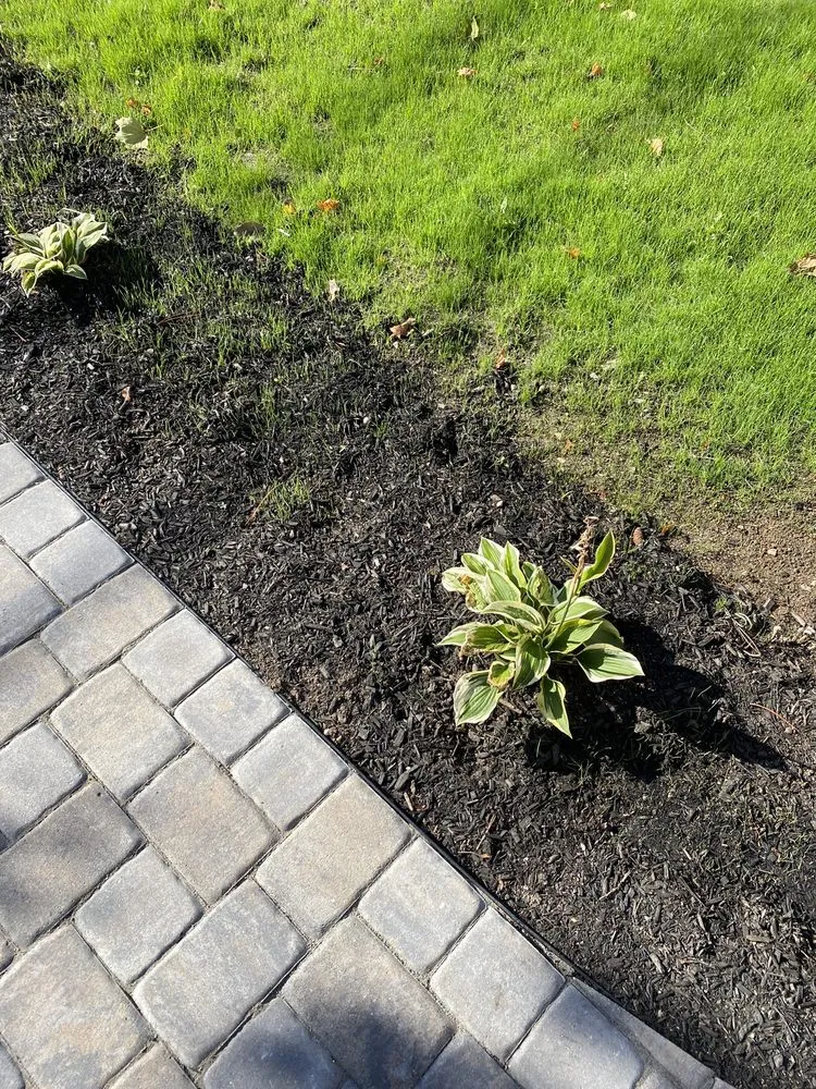 Reliable yard cleanup service with custom design across North Reading, MA - Heritage Landscape