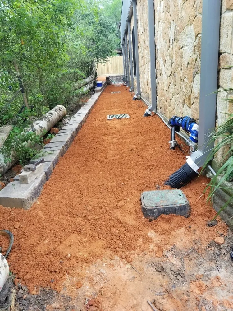 Local yard cleanup service with custom design in Conroe, TX by Heritage Landscaping