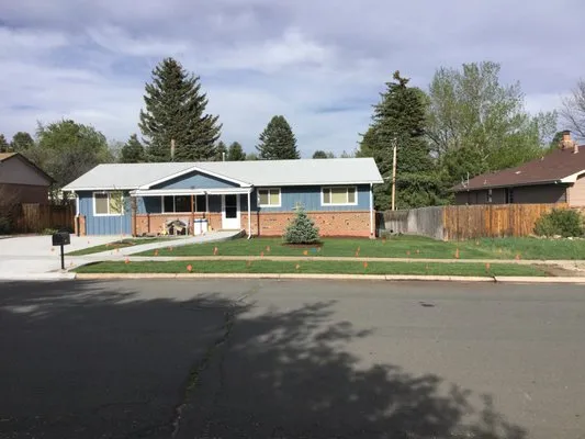 Heritage Lawn and Landscaping Logo