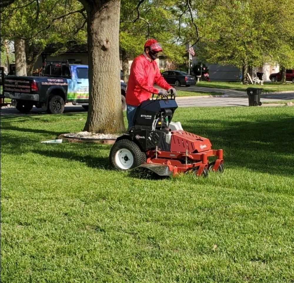 Custom residential landscaping for year-round maintenance in Topeka, KS by Heritage Lawn Care