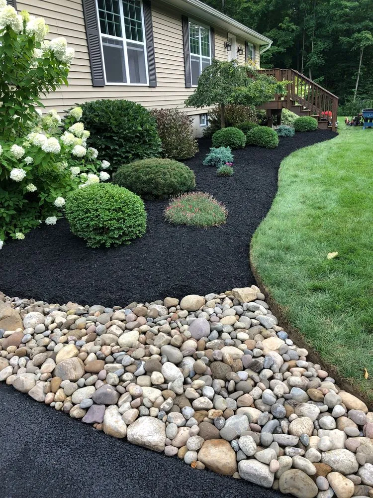 Top-rated lawn care service for residential properties in Voorheesville, NY by Heritage Lawn Care