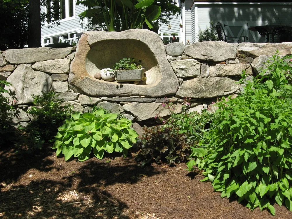 Reliable lawn care service for residential properties across Epsom, NH - Heritage Stoneworks