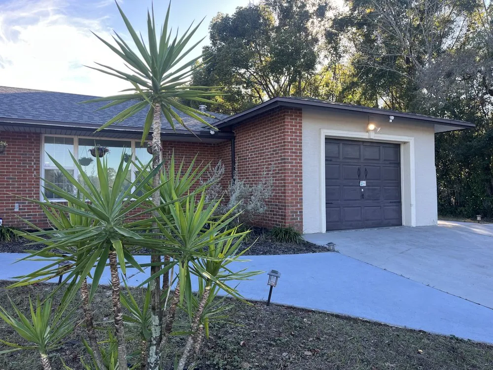 Reliable lawn care service for homes in Citrus Springs, FL by Herman Green and Stone