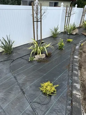 Herman Landscaping and Sprinkle Service Logo