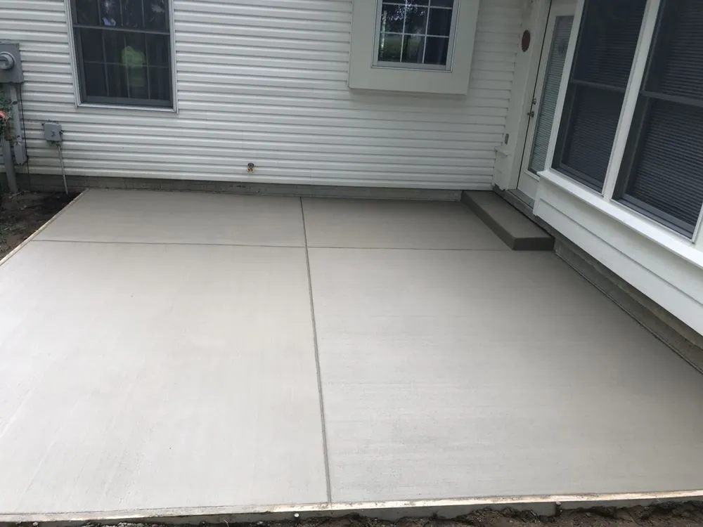 Custom lawn mowing service for beautiful yards in Toledo, OH by Hermanos Concrete