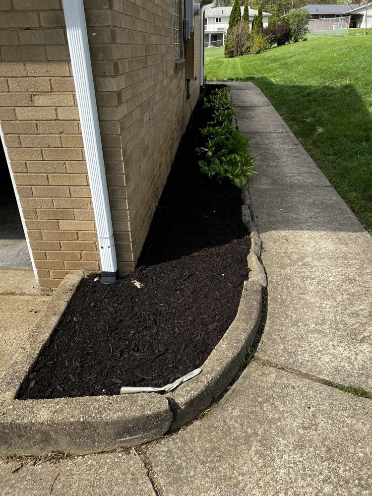 Custom residential landscaping with custom design in Canton, OH by Hermick Lawn Maintenance