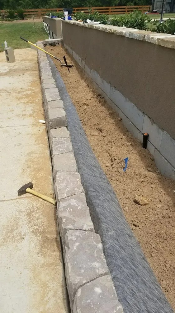 Custom outdoor landscaping in Magnolia, TX by Hernandez Landscaping & Garden Design