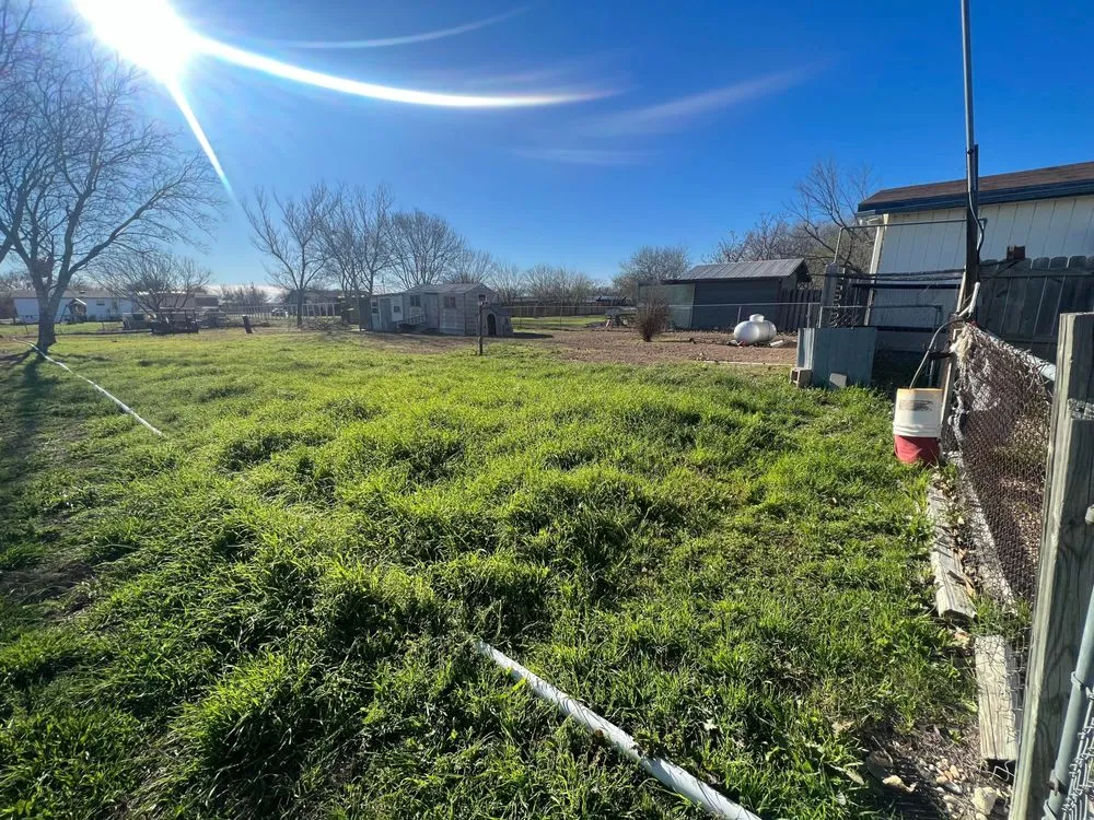 Custom garden landscaping with custom design in Seguin, TX by Hernandez Lawn and More