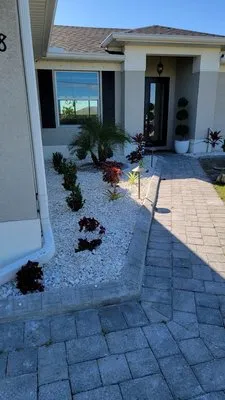 Hernandez Lawn Care and More Logo