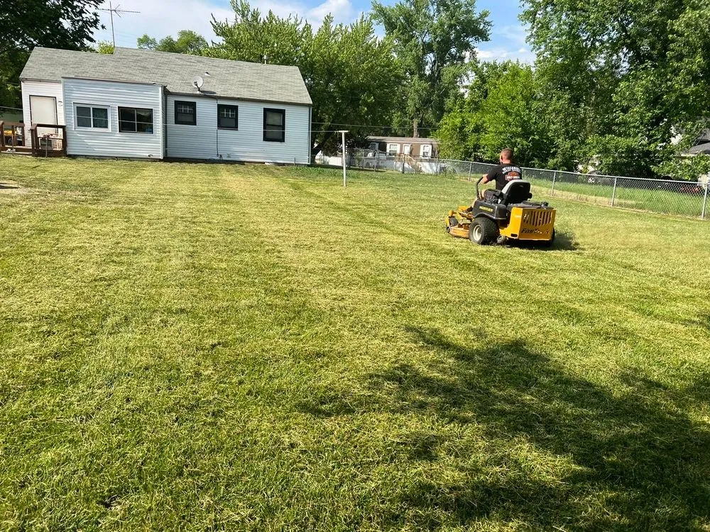 Affordable lawn mowing service with custom design across Edwardsville, KS - Hernandez Lawn Care