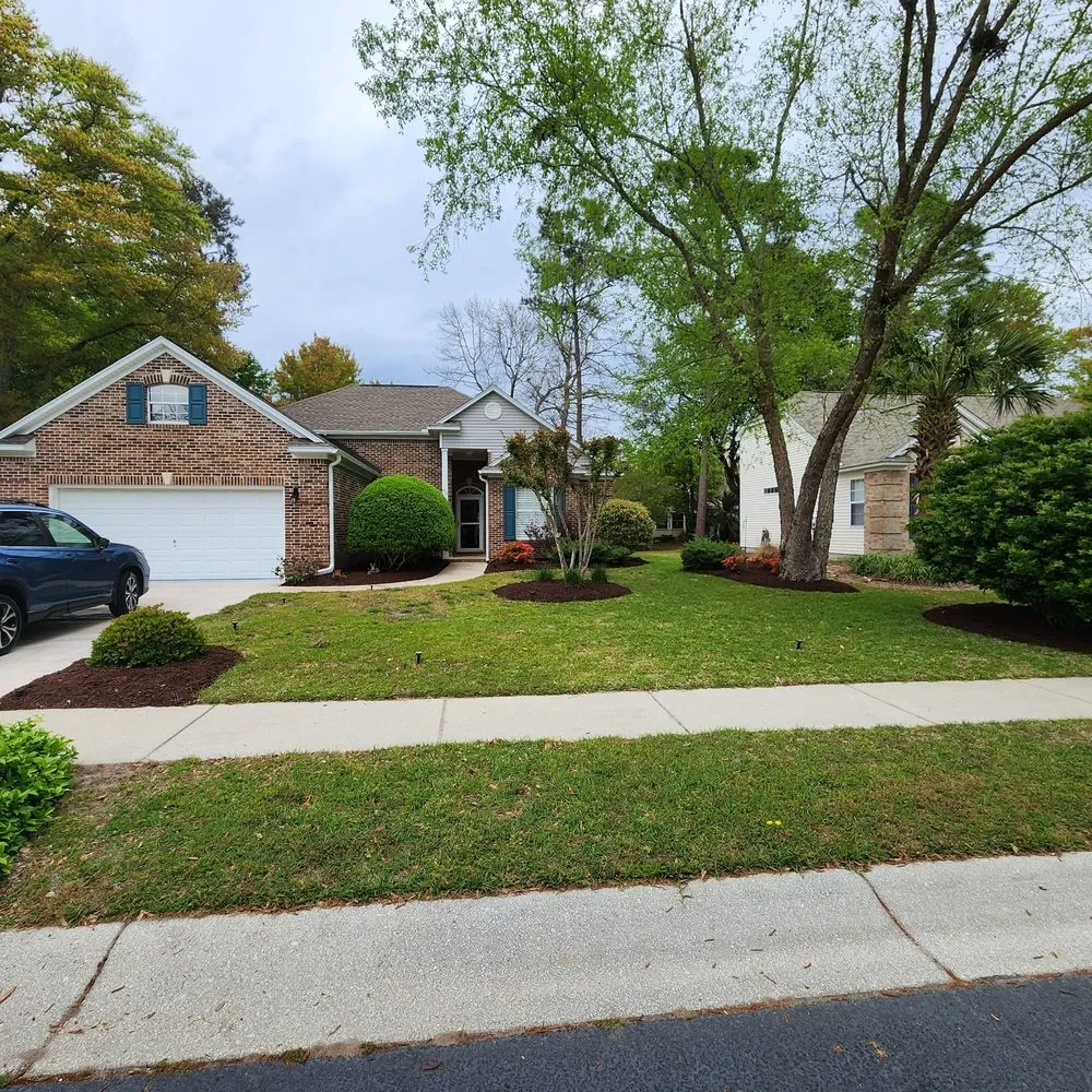 Custom landscape design for year-round maintenance across Litchfield Beach, SC - Hernandez Yardscapes