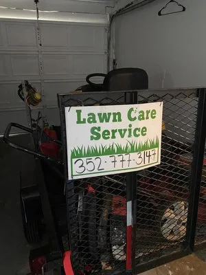 Hernando Lawn Barbers Logo