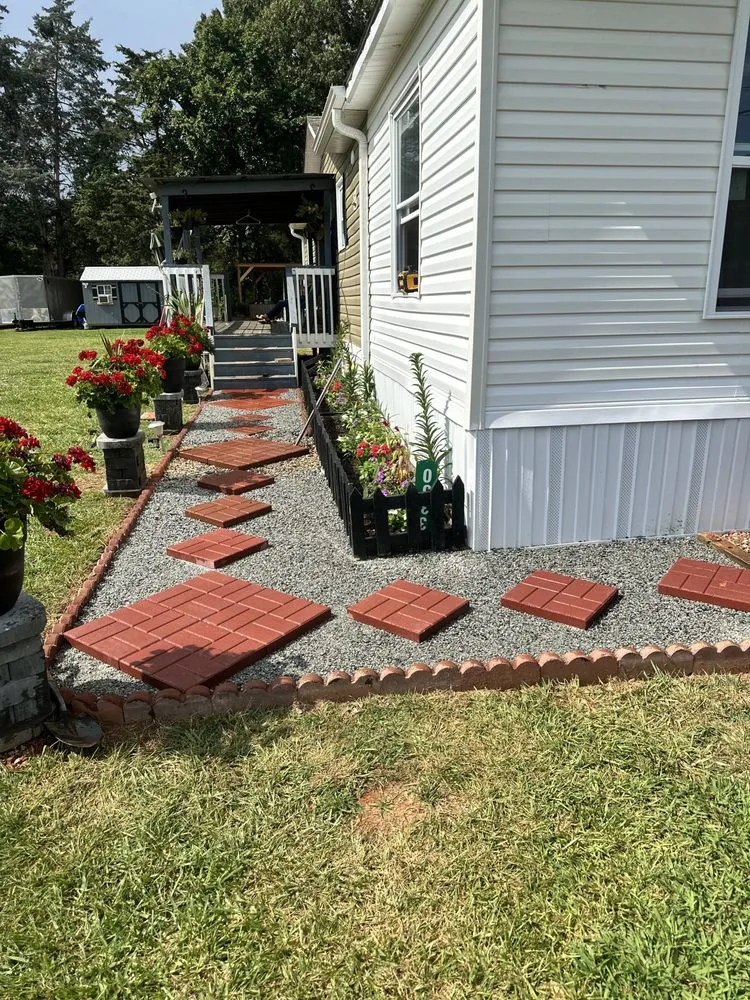 Custom yard maintenance with custom design in Sophia, NC by Herrera Concrete