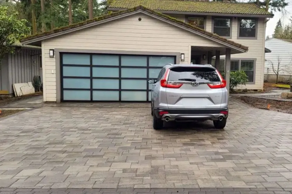 Professional yard cleanup service for year-round maintenance in Bellevue, WA by Herrera Hardscapes