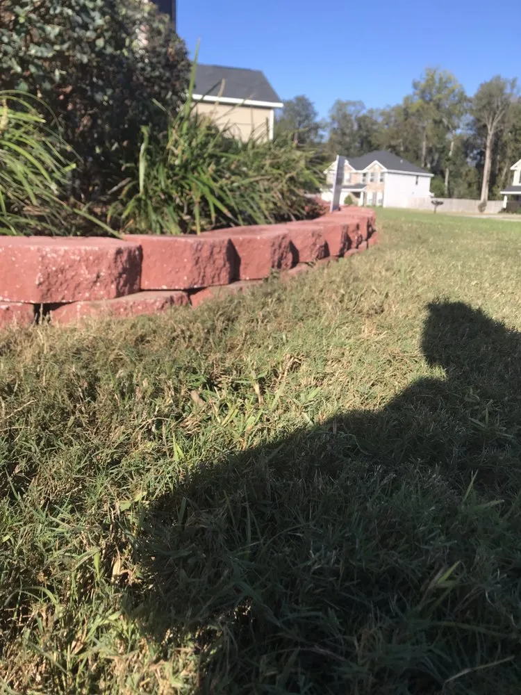 Custom lawn care service with custom design in Allenhurst, GA by Herrington Enterprises Landscapes & Designs