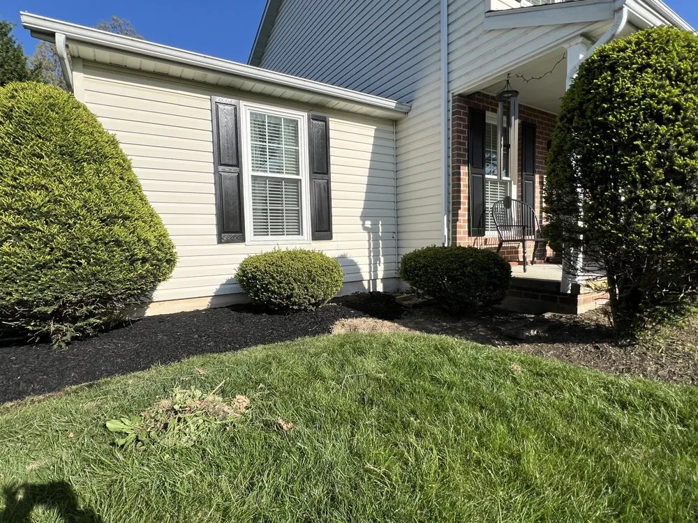 Affordable yard cleanup service for homes in Littlestown, PA by Hess Lawncare and Landscaping
