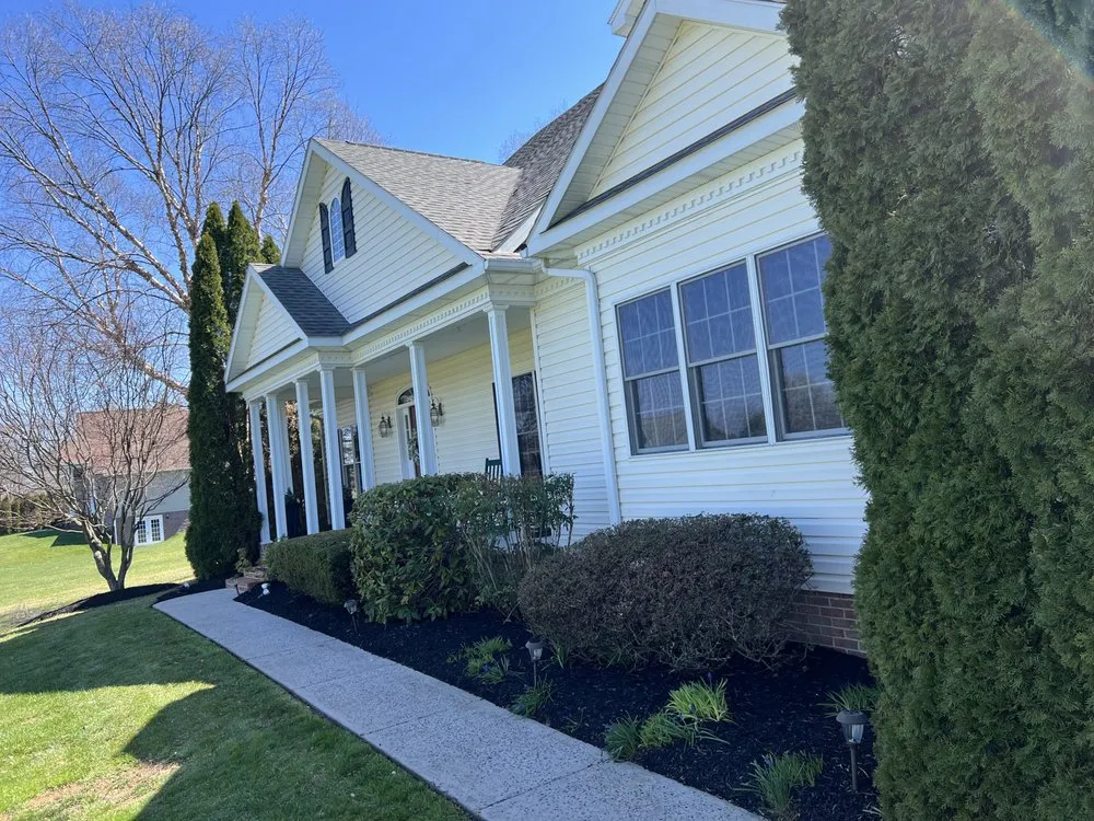 Expert yard cleanup service for homes in Littlestown, PA by Hess Lawncare and Landscaping