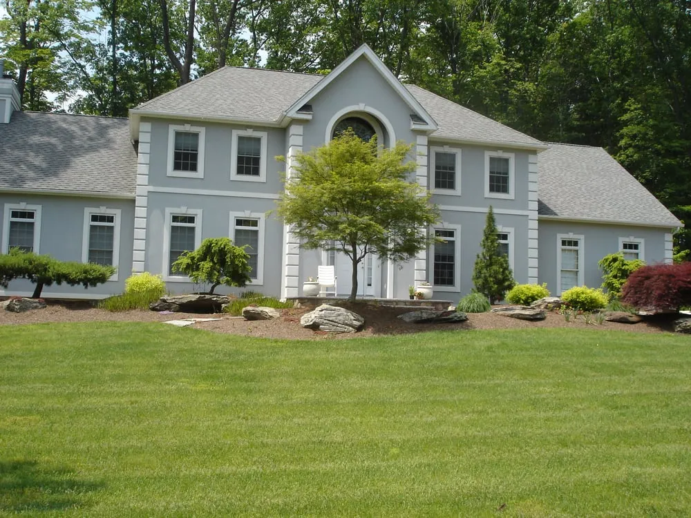 Expert lawn care service for homes in Tuxedo, NY by Hickory Hollow Landscapers Ltd.