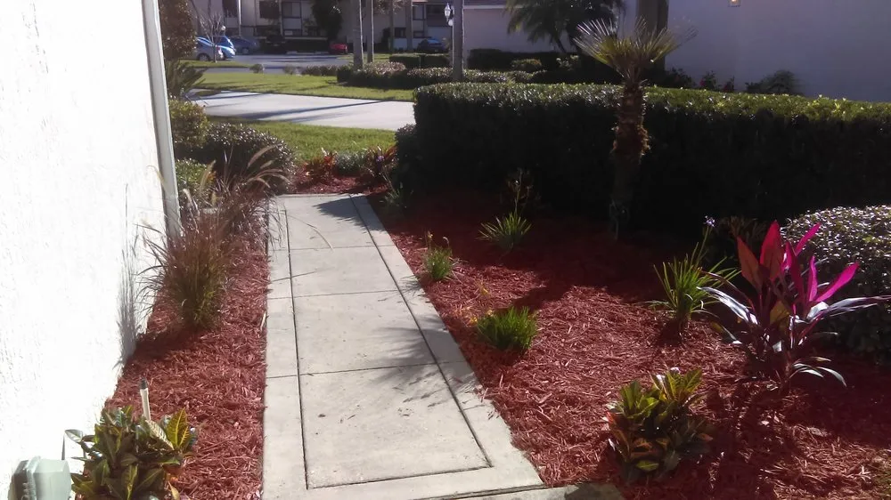 Custom landscape installation for residential properties in Orlando, FL by Hicks & Hicks Lawn and Services