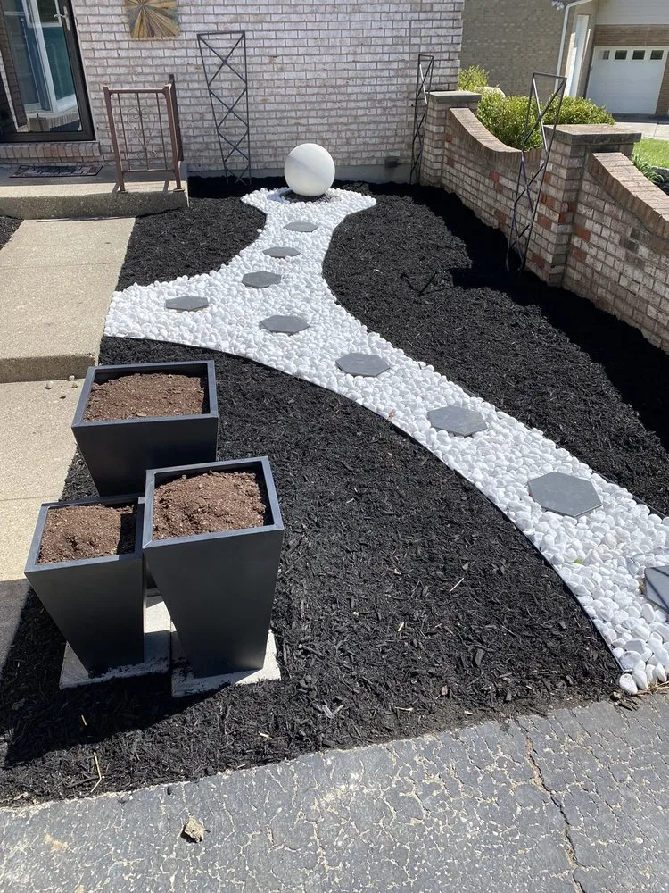 Custom yard cleanup service for homes in Cincinnati, OH by Hicks Lawn And Landscape