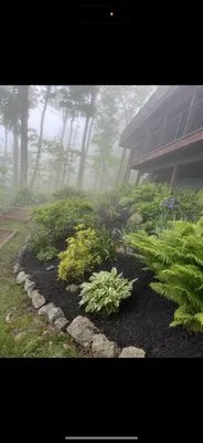 Hicks Lawn Management Logo