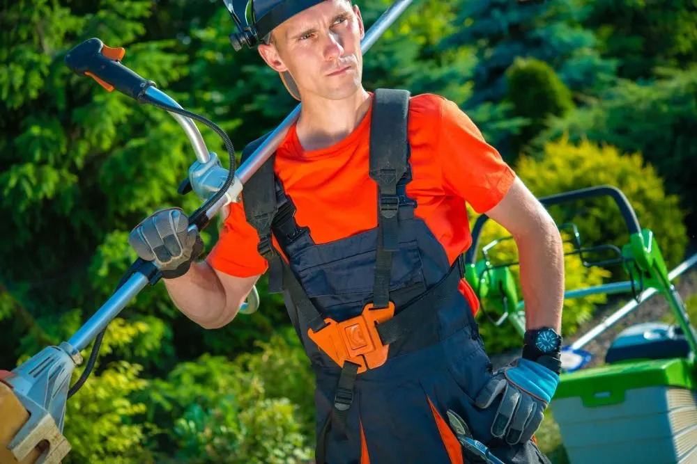 Reliable lawn mowing service experts serving Augusta, KS - High Caliber Landscape