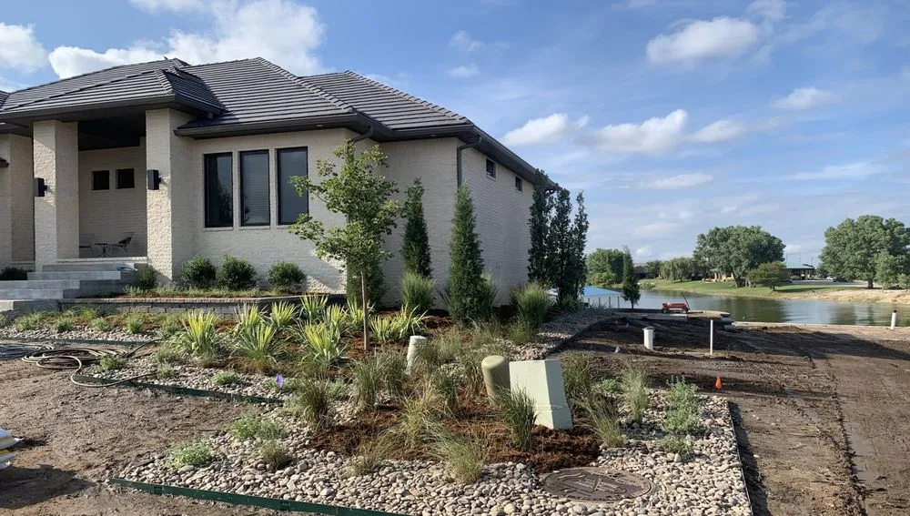 Reliable landscaping services with custom design in Augusta, KS by High Caliber Landscape