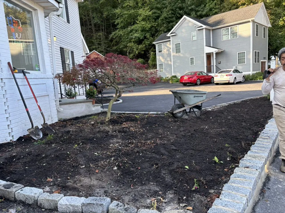 Expert lawn mowing service for year-round maintenance in Rocky Point, NY by High Grade Landscaping & Property Maintenance