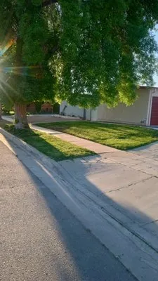 High Man Landscaping Services And Hauling Logo