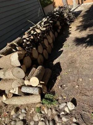 High Quality Landcaping & More Logo