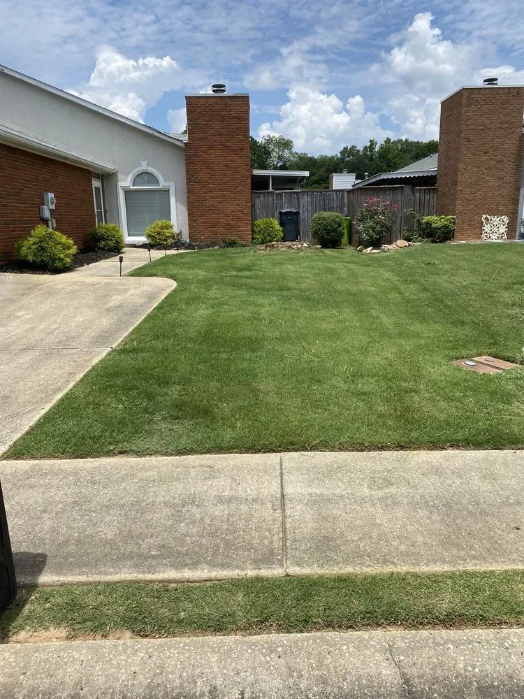 Local yard cleanup service for year-round maintenance in Fayetteville, GA by High Quality Lawn Maintenance