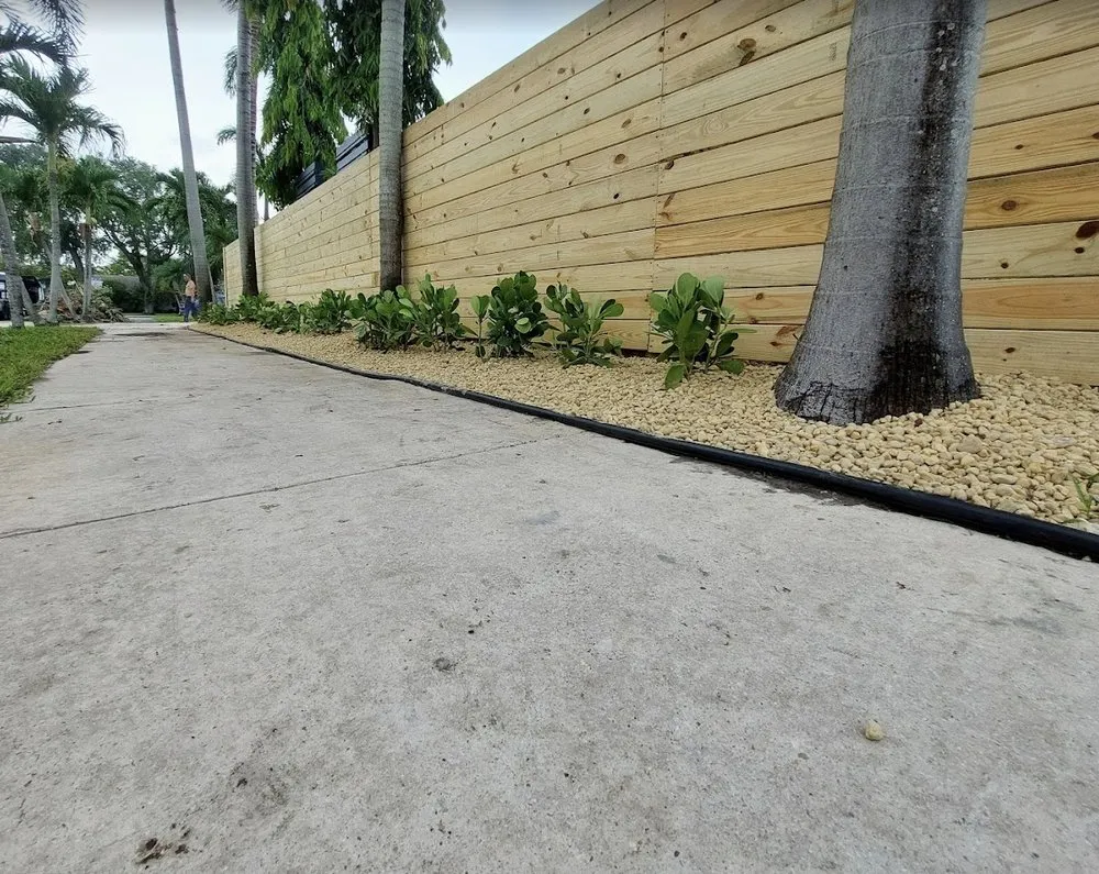 Trusted lawn mowing service for homes in Hollywood, FL by High Standards Tree Care