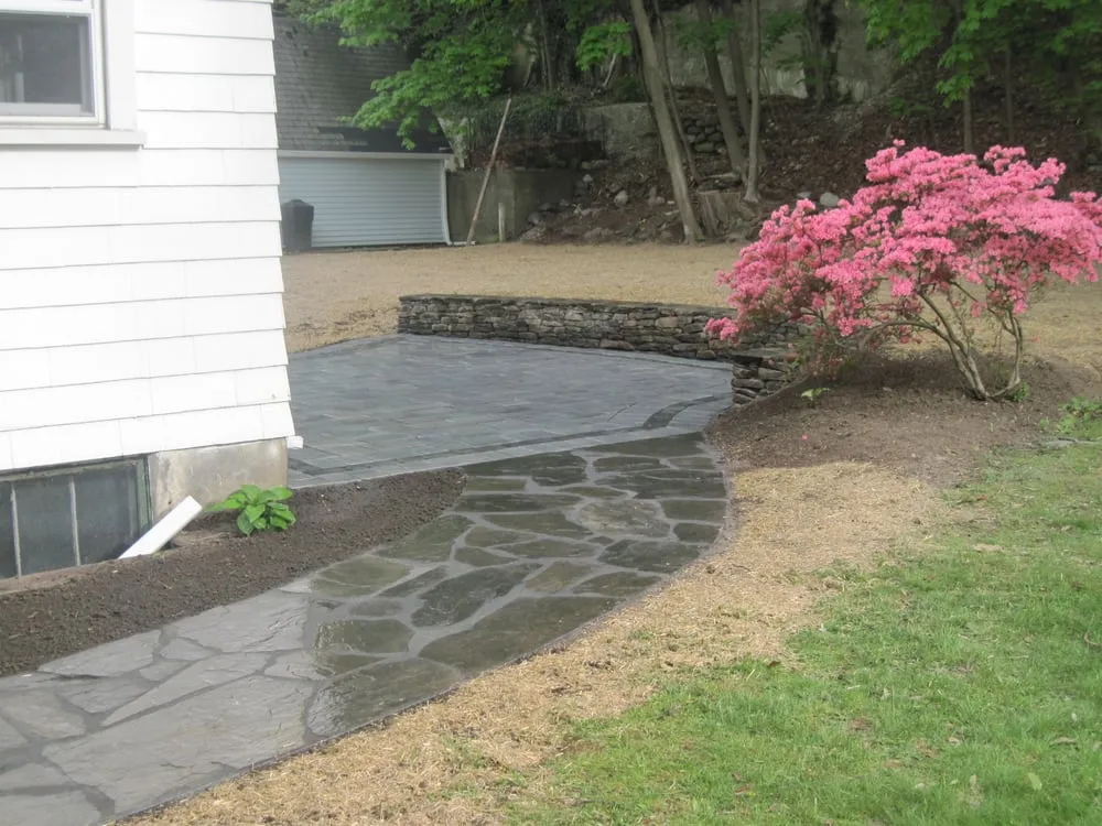 Custom outdoor landscaping for residential properties in Boxborough, MA by Highgarden Landscape