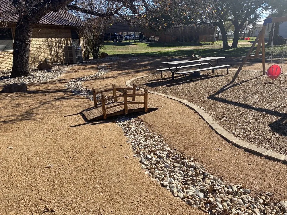 Professional lawn mowing service for outdoor upgrades in Marble Falls, TX by Highland Lakes Landscape Management