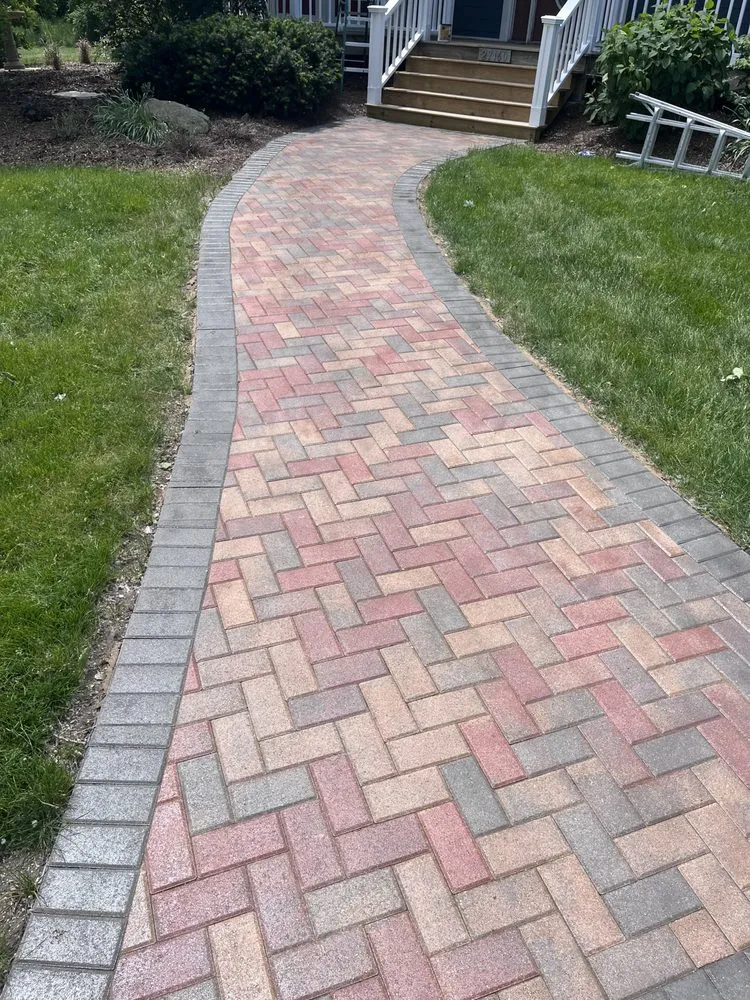 Professional yard cleanup service for homes in Joliet, IL by Highland Landscape