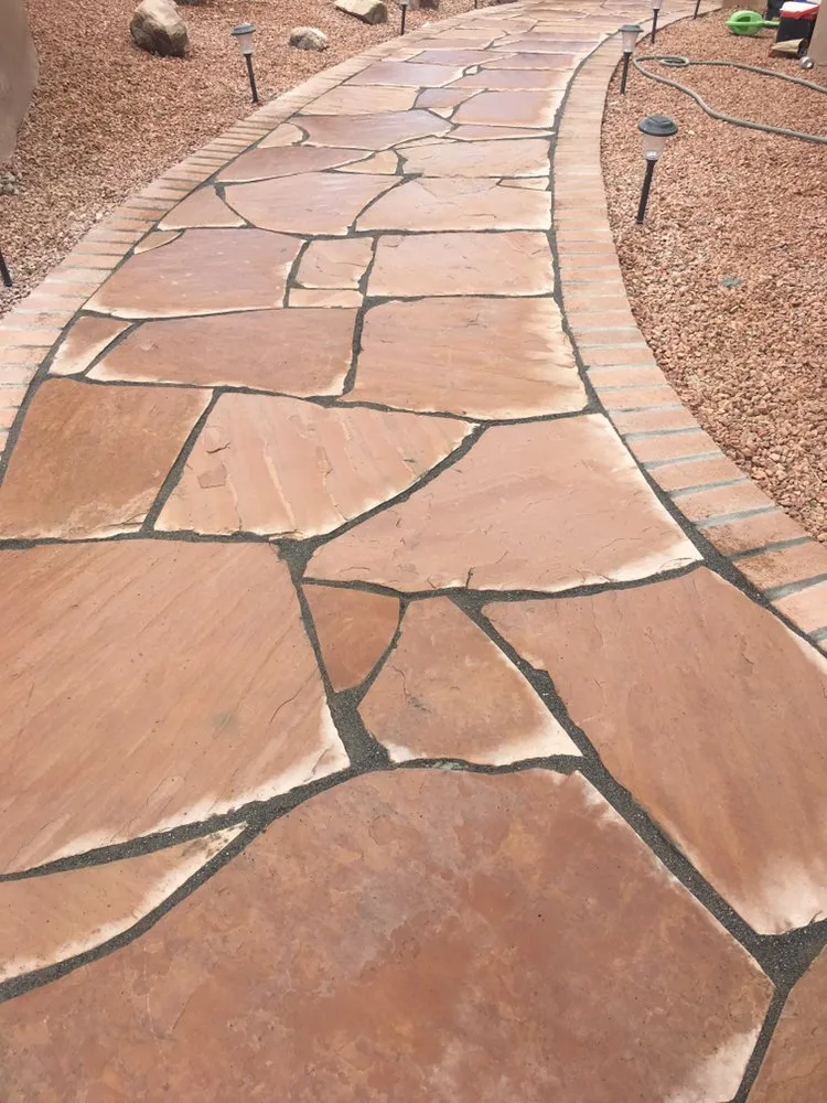 Expert lawn care service with custom design across Rio Rancho, NM - Highland Landscaping