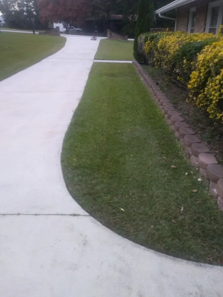 Trusted lawn mowing service with custom design across Lithonia, GA - Hight's Helping Hands Lawn Care
