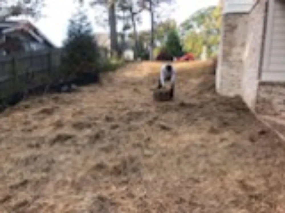 Custom landscape installation for beautiful yards in Lithonia, GA by Hight's Helping Hands Lawn Care