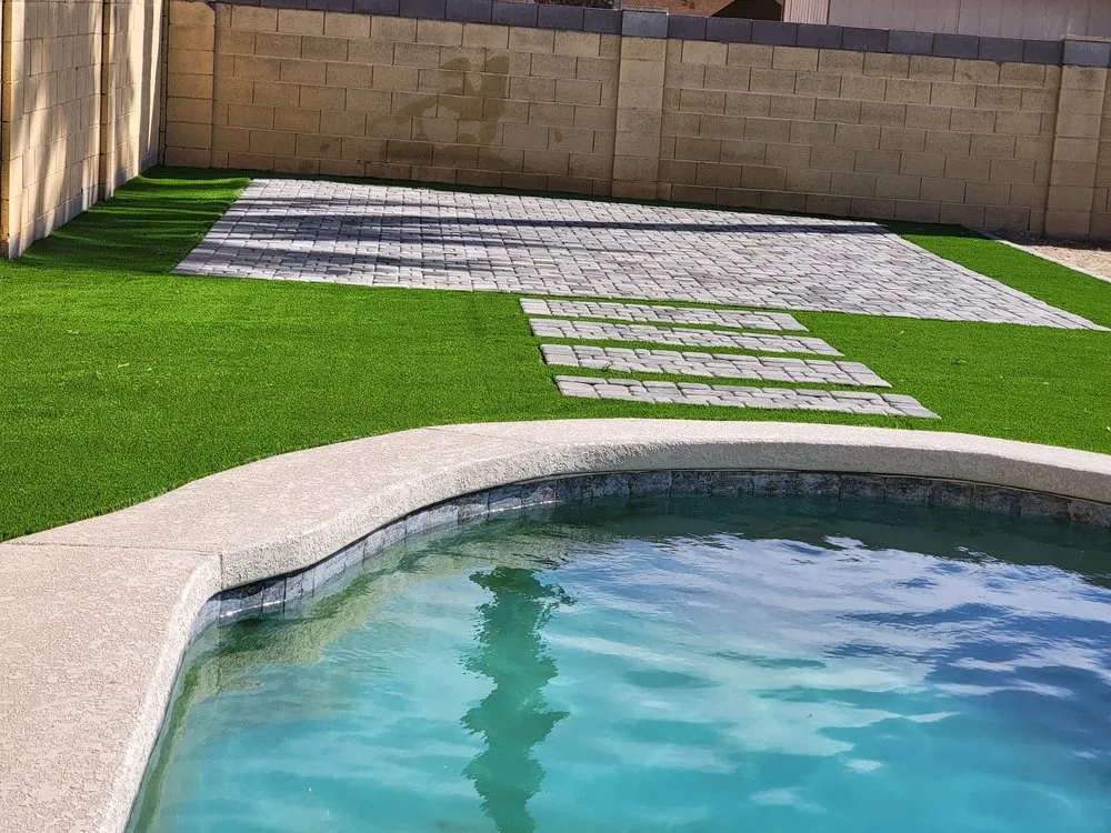 Affordable lawn mowing service for residential properties in Phoenix, AZ by Higueras Hardscape