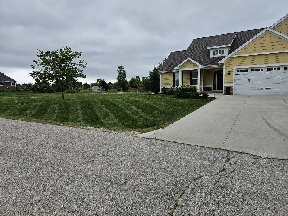 Local lawn care service for residential properties in Sheboygan, WI by Hilbelink's Lawn Care