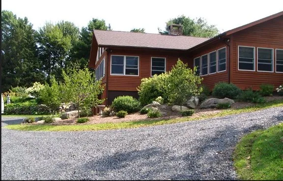 Custom lawn care service with custom design across Rutland, VT - Hill Country Landscaping & Masonry