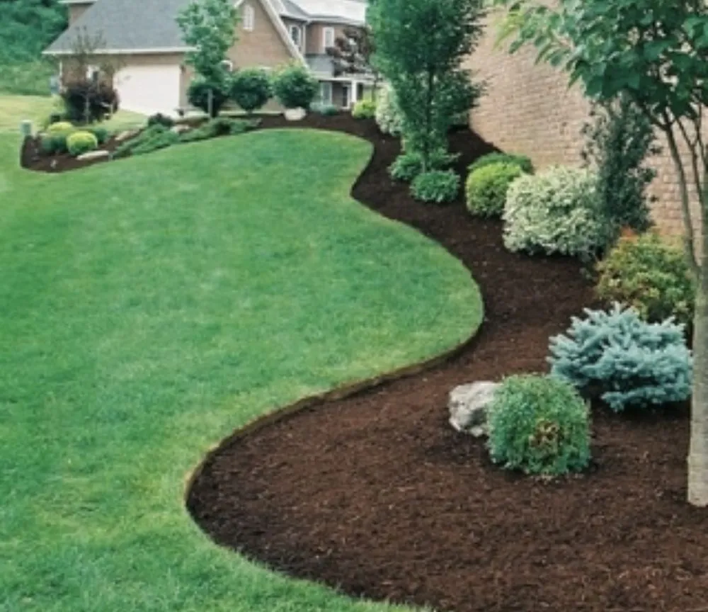 Professional outdoor landscaping with custom design in Ankeny, IA by Hill Property Services