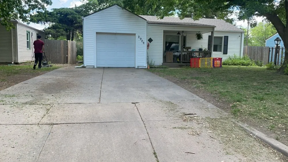 Professional lawn care service in Wellington, KS - Hillside garden scapes