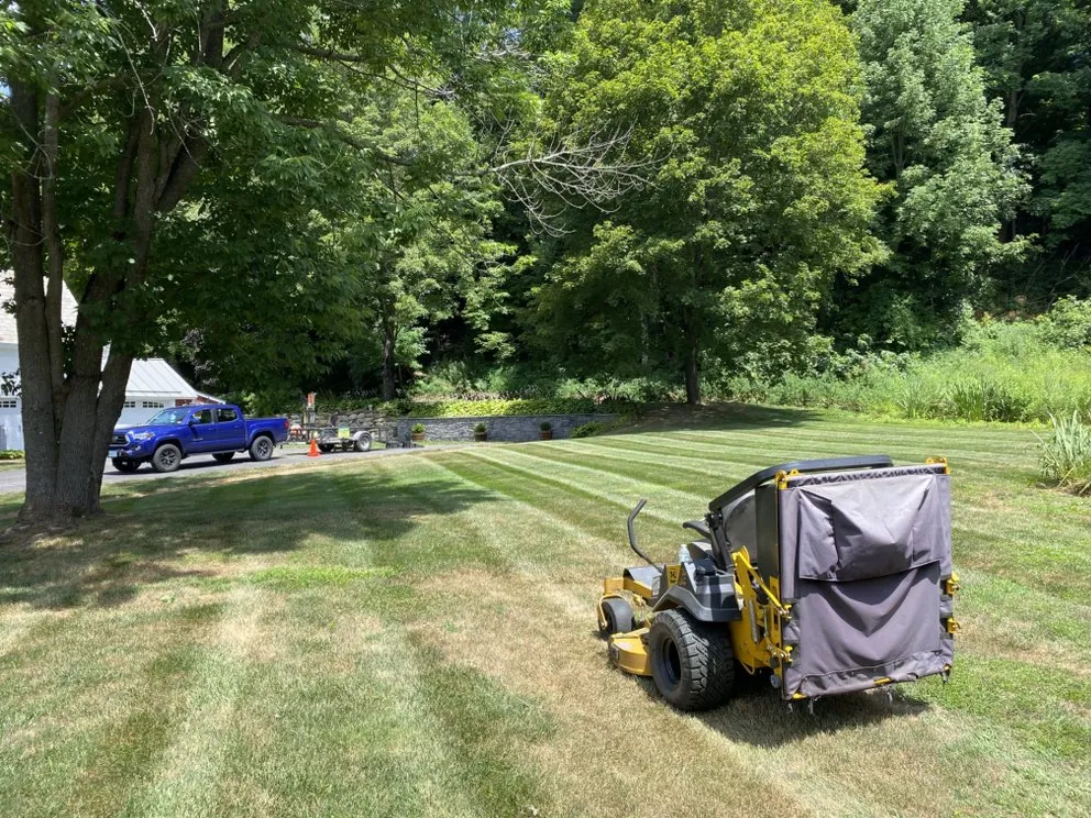 Custom landscape design for year-round maintenance across Hinsdale, NH - Hilltop Helper