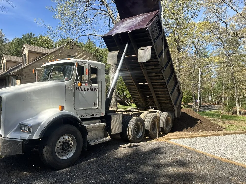 Custom landscape installation for beautiful yards in Scituate, RI by Hillview Landscaping
