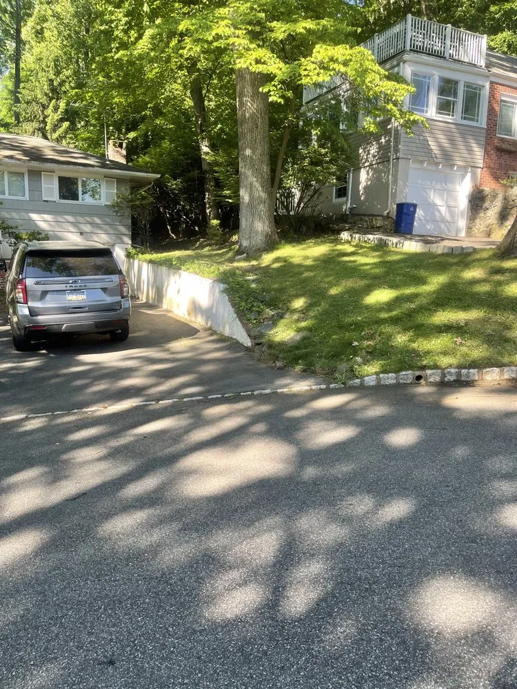 Custom yard maintenance for residential properties in Livingston, NJ by His and Hers Landscaping