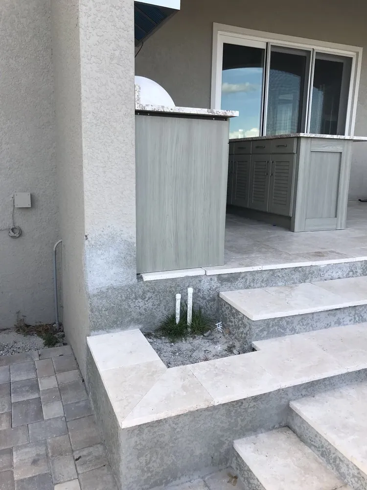 Local yard cleanup service for residential properties in Tampa, FL by Hive Outdoor Living